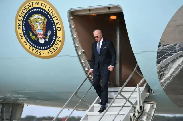 US President Joe Biden steps off Air Force One upon arrival at Andrews Air Force Base in Maryland on April 19, 2022.