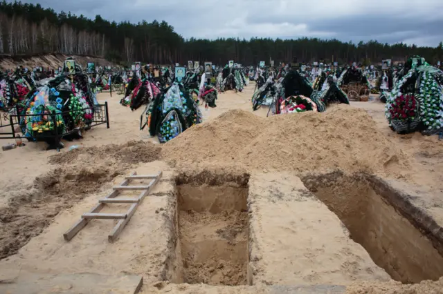 A view of the fresh graves on April 18, 2022 at the cemetery in Bucha, Ukraine.