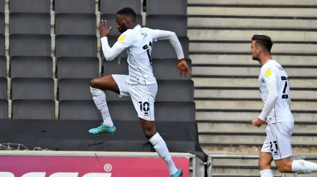 MK Dons celebrate