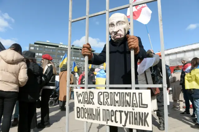 A demonstrator dressed as Russian President Vladimir Putin in prison is seen during a demonstration against Russia"s invasion of Ukraine, in Helsinki, Finland, April 2, 2022.