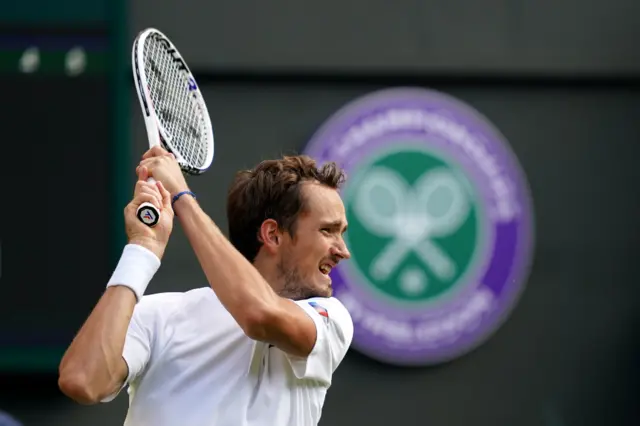 Daniil Medvedev playing tennis at Wimbledon last year