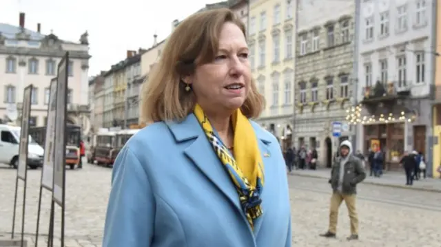 Kristina Kvien speaks to the media in Lviv, Ukraine, 15 February 2022