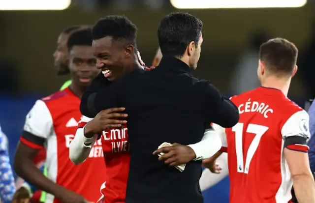 Eddie Nketiah is congratulated by Arsenal manager Mikel Arteta after scoring twice against Chelsea