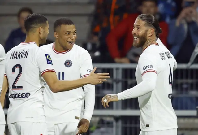 Sergio Ramos is congratulated by Paris St-Germain team-mates after scoring against Angers