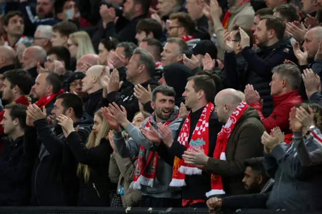 Liverpool fans applaud to show support to Cristiano Ronaldo and his family