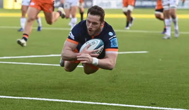 Mark Bennett scores the game's opening try