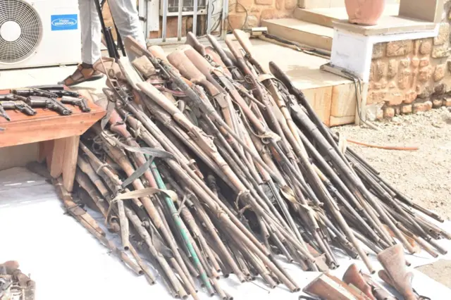 Guns collected from civilians displayed in Jos, Nigeria