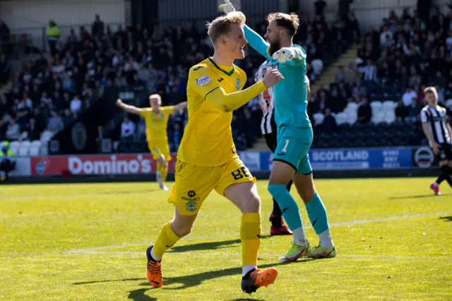 Ewan Henderson celebrates his first goal for the club