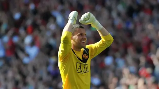 Ben Foster celebrating while playing for Manchester United against City in 2009