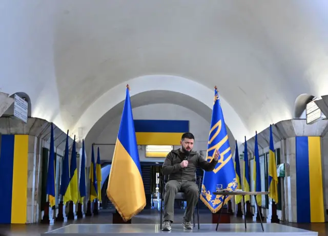 Ukraine's President Volodymyr Zelensky holds a press conference in the Kyiv metro