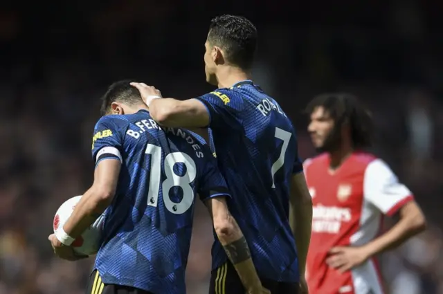 Cristiano Ronaldo comforts Bruno Fernandes