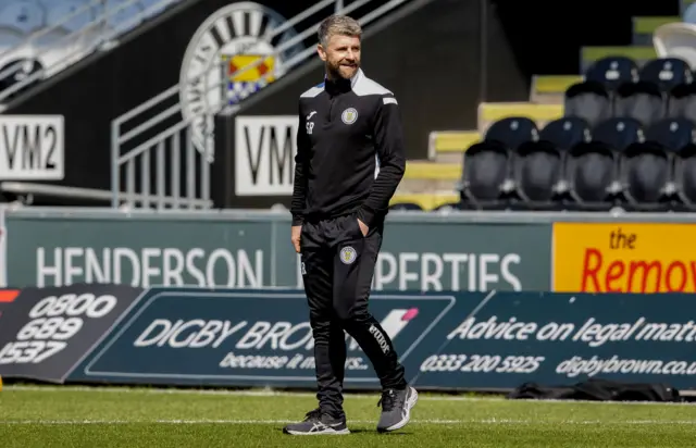 St Mirren boss Stephen Robinson walks on the pitch