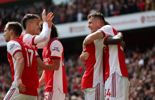 Granit Xhaka celebrates after scoring against Manchester United