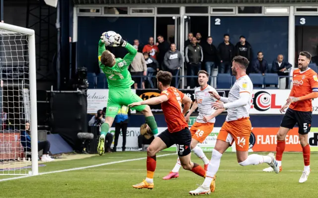 Luton keeper Harvey Isted catches a cross