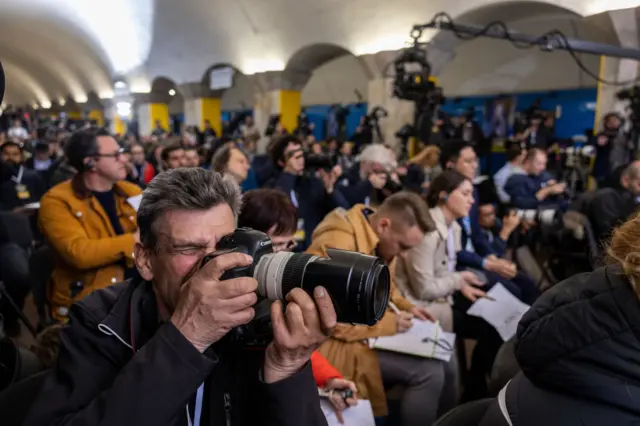 Media cover a press conference held by Ukraine's President Volodymyr Zelensky in Kyiv