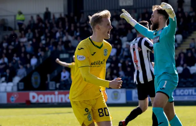 Hibs scorer Ewan Henderson celebrates