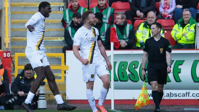 Nicky Devlin celebrates making it 1-0