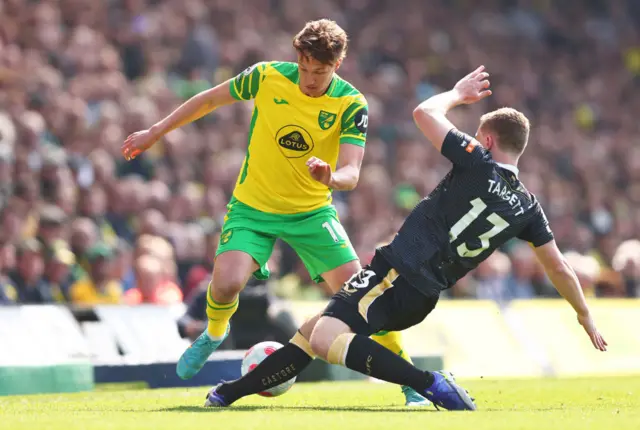 Kieran Dowell is tackled by Matt Targett