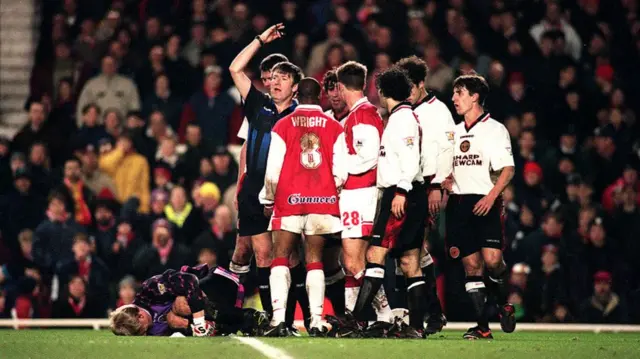 Players clash after Ian Wright tackle on Peter Schmeichel