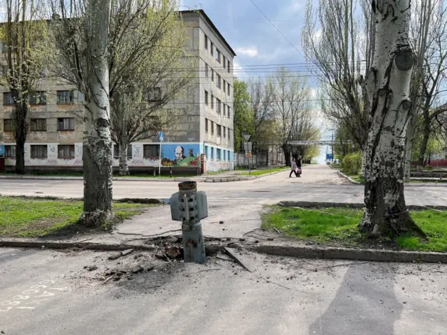 A missile stuck in a town road in Rubizhne, Ukraine's eastern Luhansk region. Photo: 21 April 2022