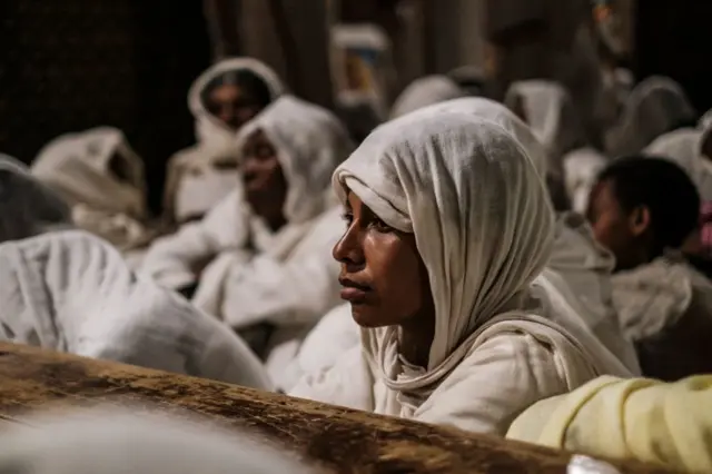 Worshipper in a church