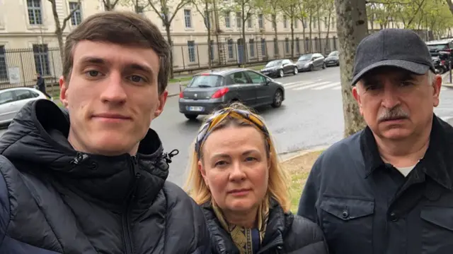 Nikita Shepel, with grandparents Oleksandr and Vira