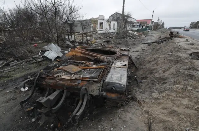 A damaged Russian tank near a road in Zalisia village not far from Kyiv