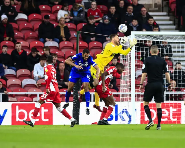 Middlesbrough's Luke Daniels drops the ball under pressure from Cardiff City's Curtis Nelson