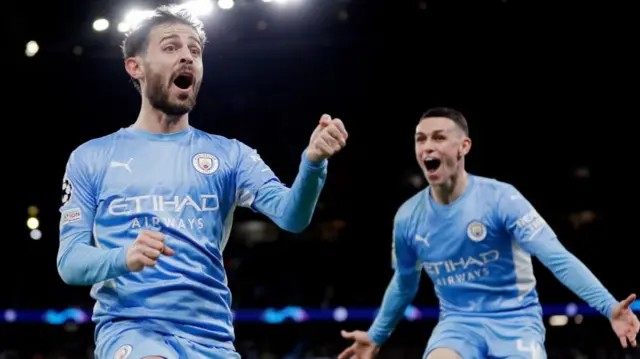 Bernardo Silva (left) celebrates