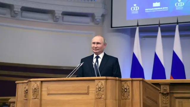 Russian President Vladimir Putin addresses a meeting of the Council of Legislators under the Russian Federal Assembly at the Tauride Palace in St. Petersburg, Russia,