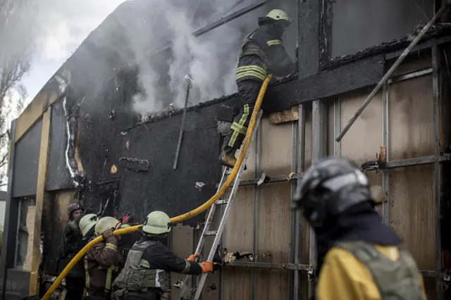 Firefighters extinguishing a fire in Saltivka, Kharkiv