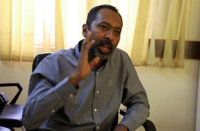 Former cabinet minister, Khalid Omer Yousif, speaks during an interview with Reuters in Khartoum, Sudan January 31, 2022