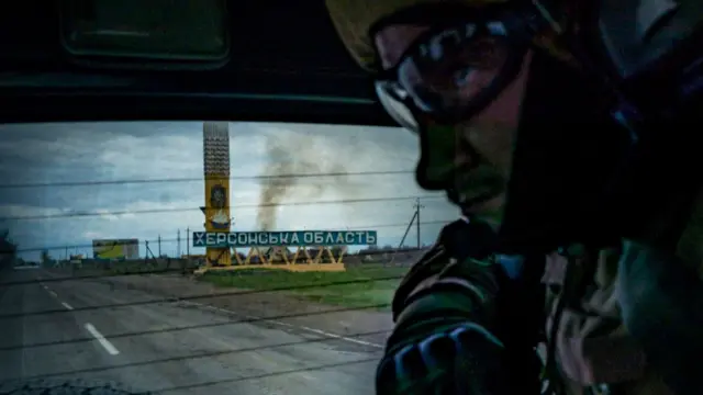 Ukrainian soldiers make a patrol in the entrance of the Kherson region, very close to the russian postions