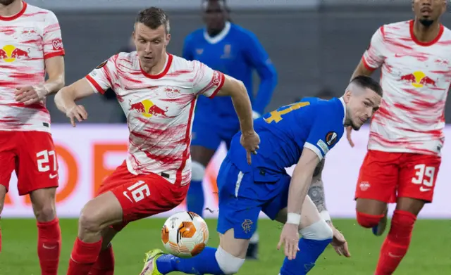 Leipzig's Lukas Klostermann takes the ball back from Rangers Ryan Kent