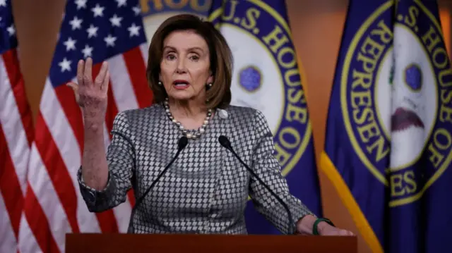 Nancy Pelosi at a news conference