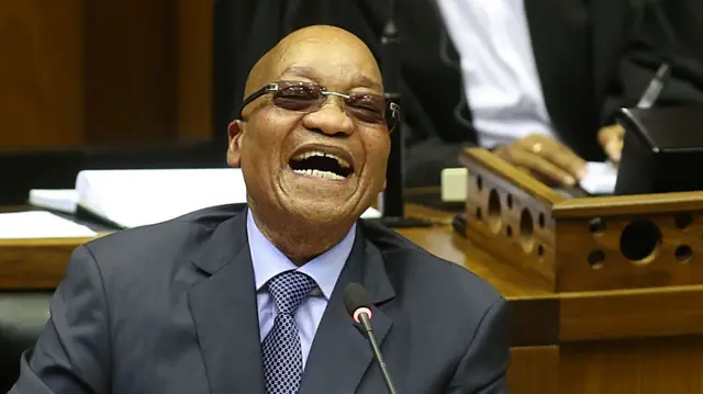 Jacob Zuma in parliament answering questions about his relationship with the Guptas in 2016