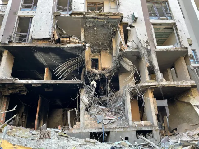 Damage to a residential building in Kyiv