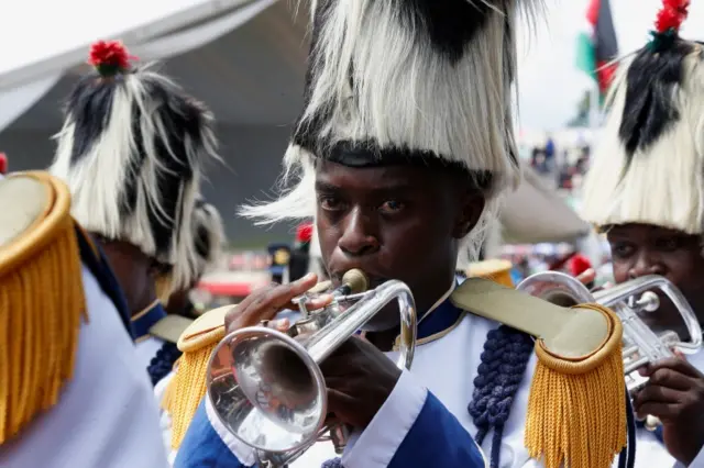 Member of a marching band at Mwai Kibaki's funeral