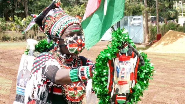 A person dressed in the colours of the Kenyan flag at the Othaya Approved School