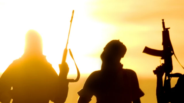 Generic shot of gunmen at sunset