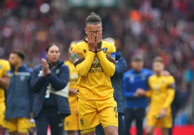 Louis Jean cries after Sutton's defeat