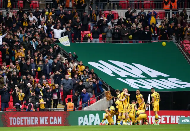 Sutton celebrate with their fans