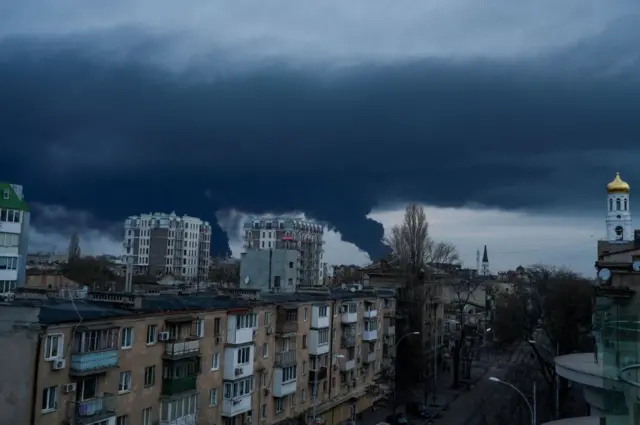 Image shows smoke rising over ground