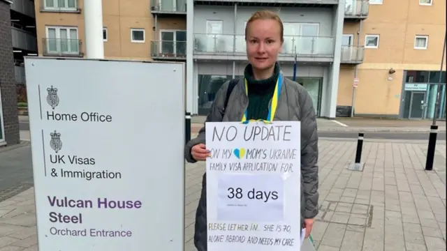 Galina Ryzhenko holds a protest outside a Home Office building in Sheffield