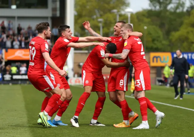 Wigan celebrate at Shrewsbury