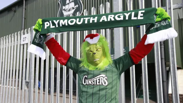 Plymouth fan dresses as the Grinch