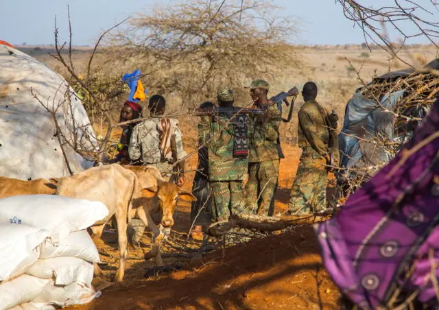 Soldiers with kalashnikovs during the Gada system ceremony, Oromia