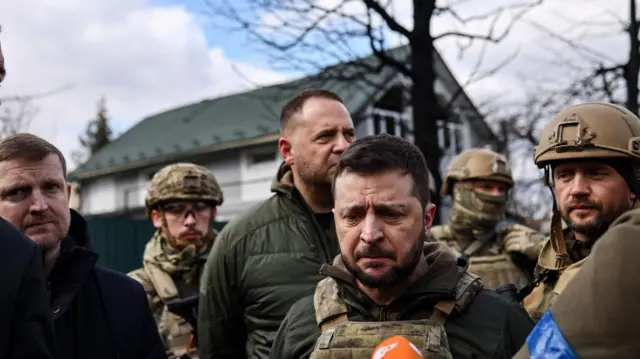 Ukraine's President Zelensky visiting Bucha with soldiers