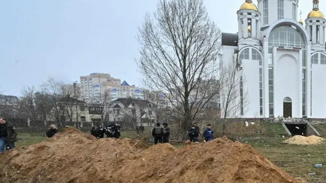 Mass grave outside church in Bucha