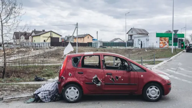 A destroyed car in Bucha